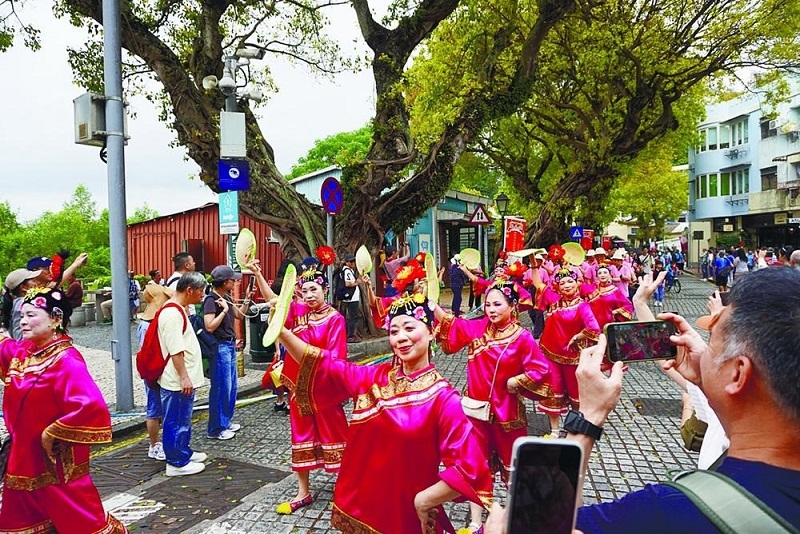 澳門路環(huán)市區(qū)的譚公誕巡游活動。澳門佛教總會供圖